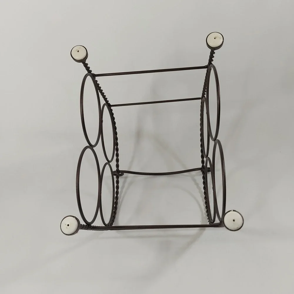Wine Rack Wrought Iron with Scroll Design Holds 4‎ Bottles. Good Condition.